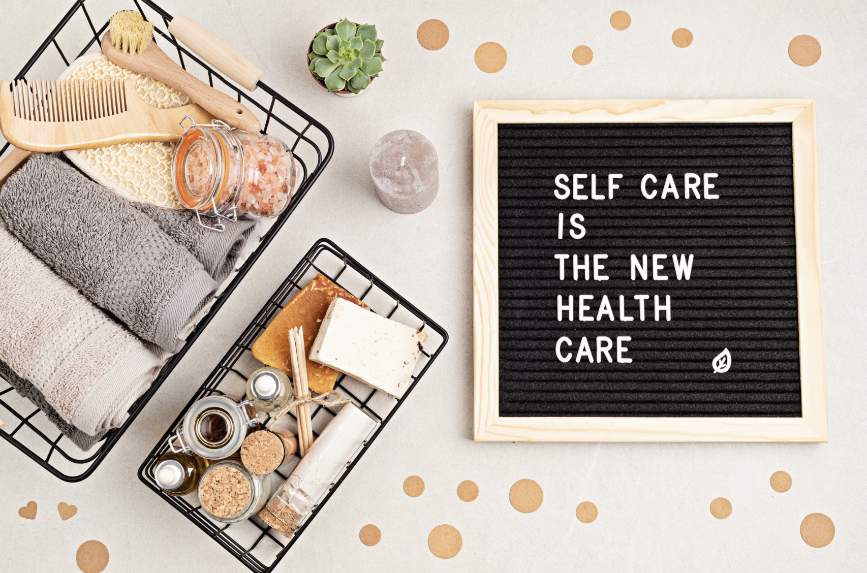 Self-care is the new health care sign next to baskets of self-care products promoting the idea of holistic wellness